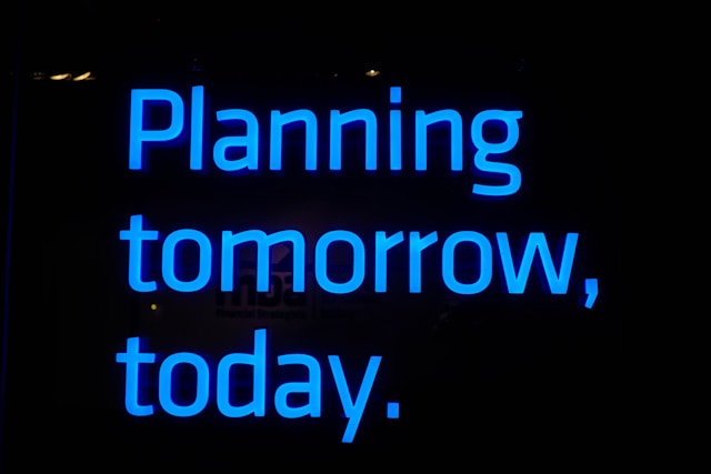 Blue text saying 'planning tomorrow, today'